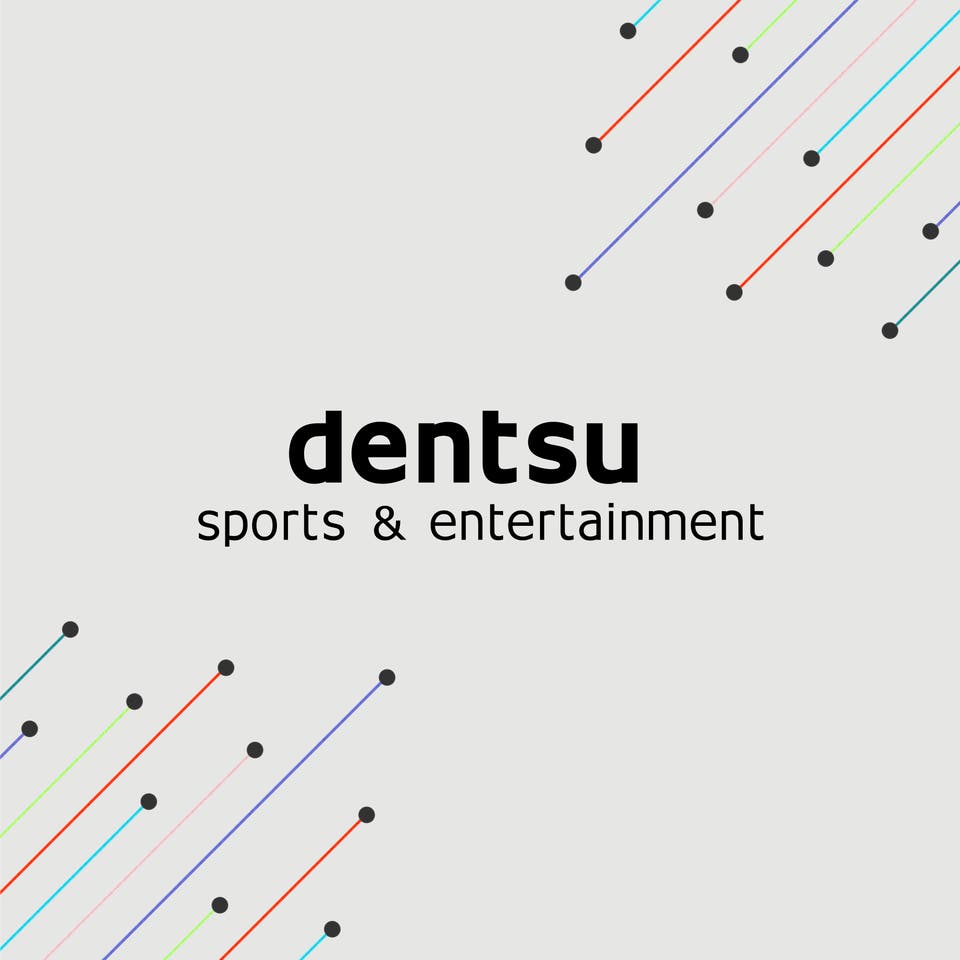grey background with the copy dentsu Sports & Entertainment in the centre